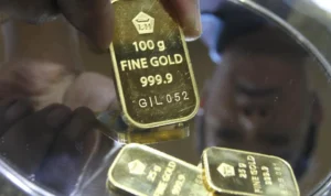 Ketegangan The Fed dan Trump Pengaruhi Emas